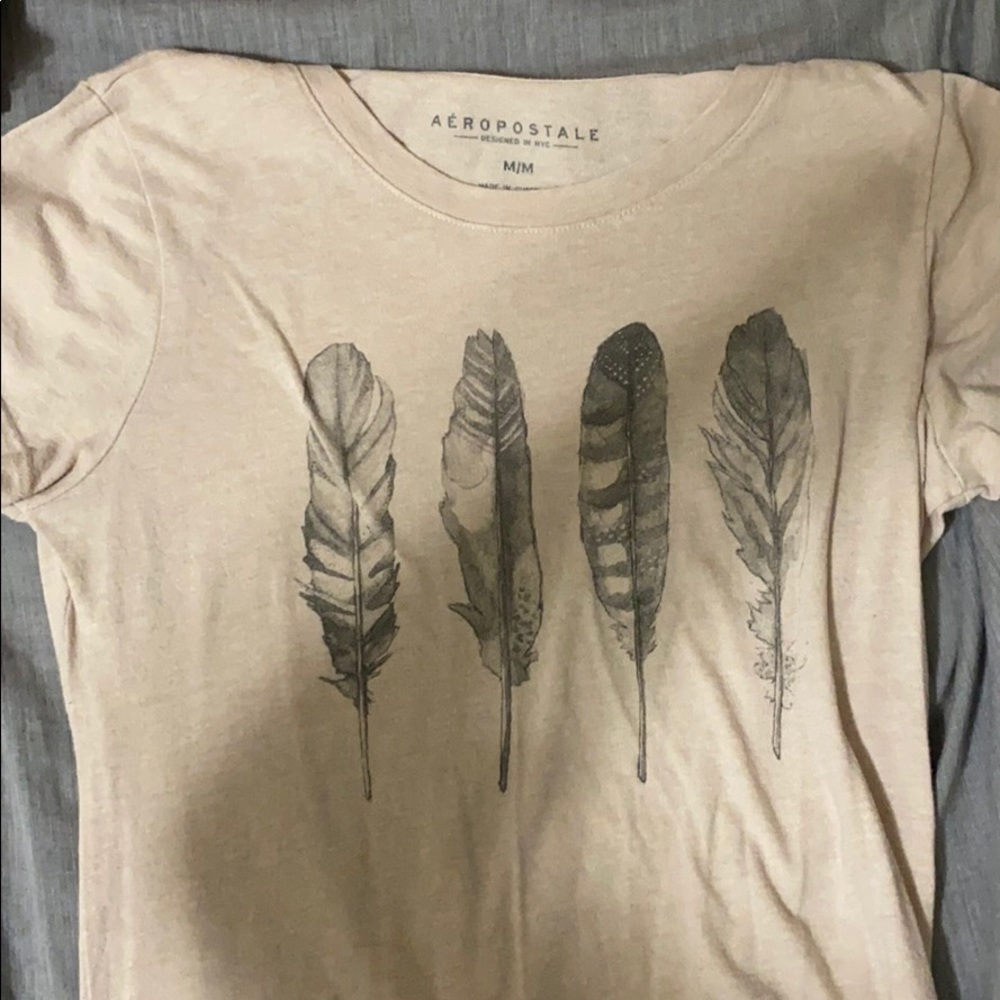 light pink feather shirt